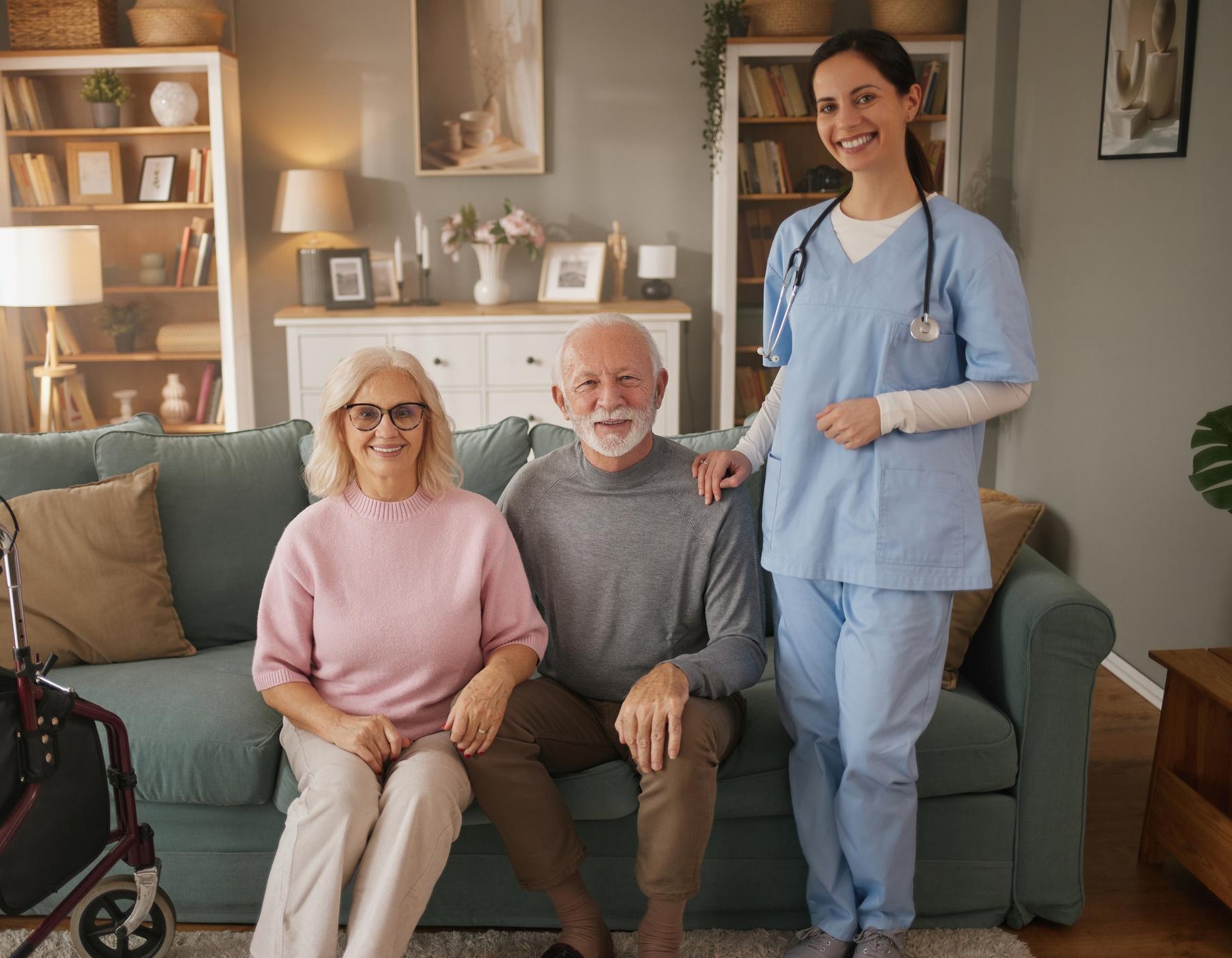 Certified nurse caring for an elderly patient at home